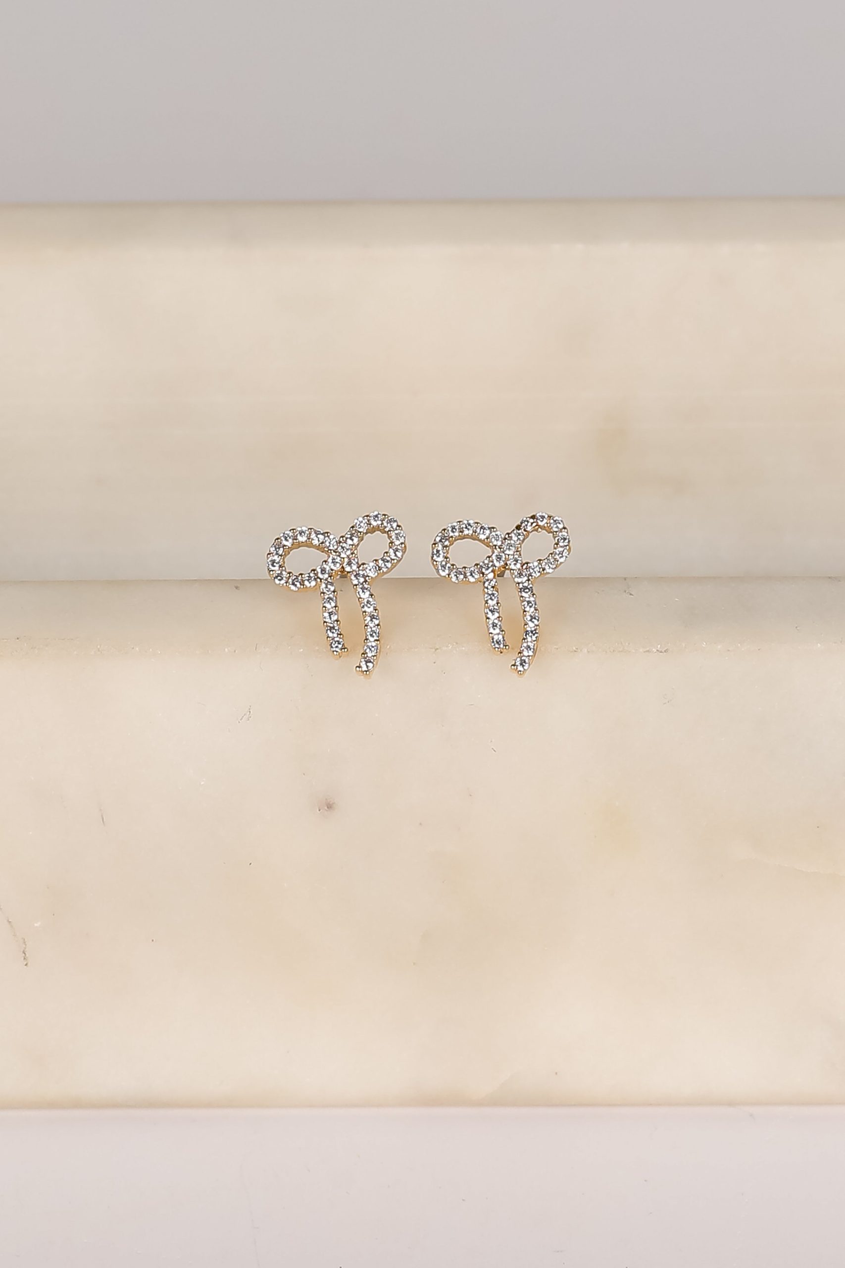 shopdressup_gold_rhinestone_bow_earrings-4_98a7166c-7da1-4198-8423-8f636e9b372f.jpg