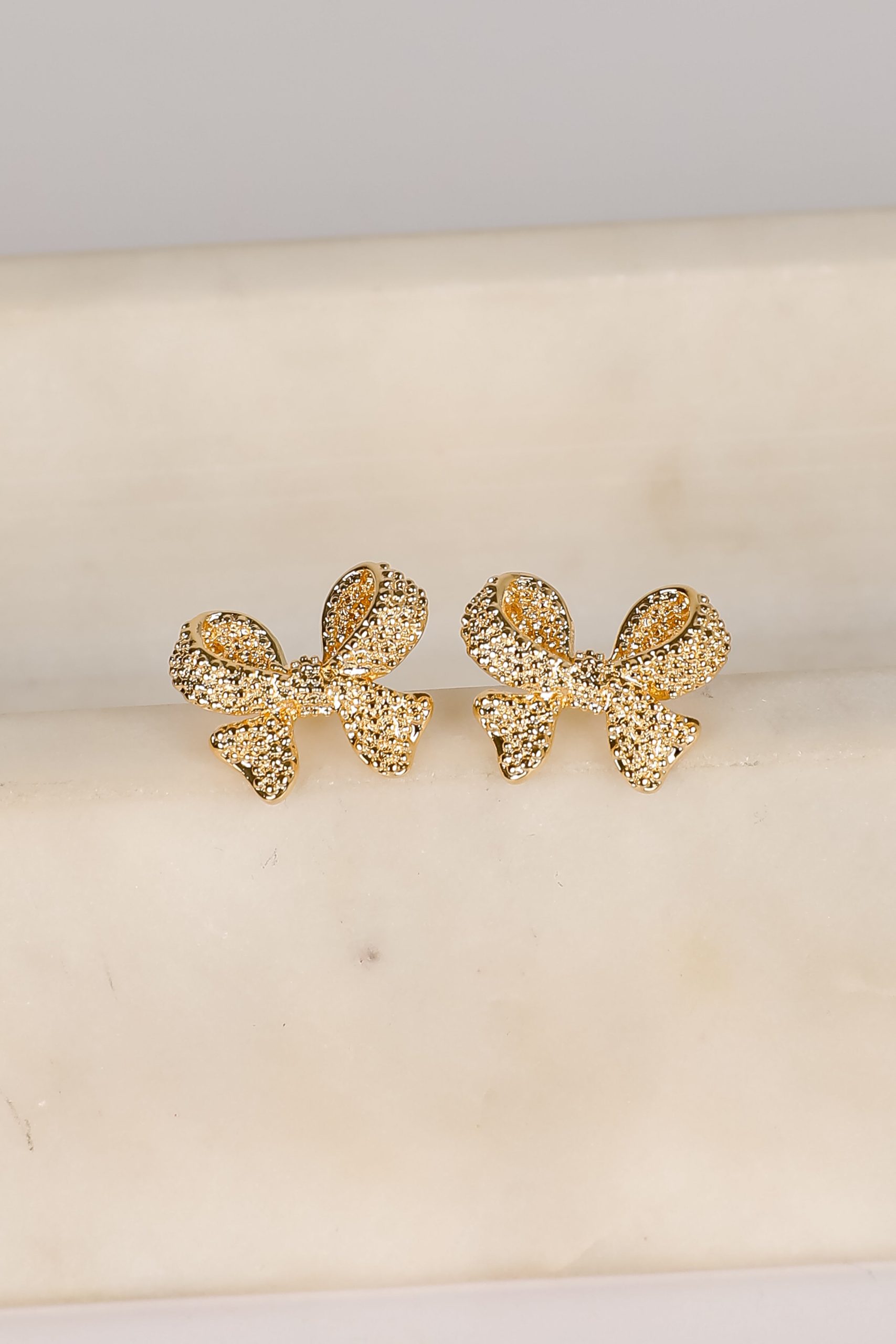 shopdressup_gold_textured_bow_earrings-2.jpg